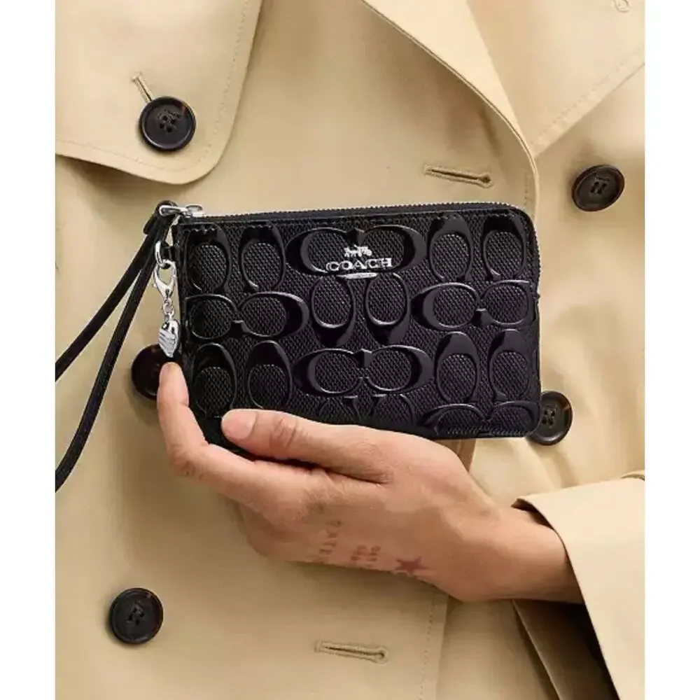 Coach Corner Zip Wristlet
In Signature Leather With Heart Charm Black - Picture 3 of 3